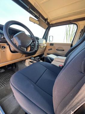 Blue 2000 Jeep Wrangler Sport