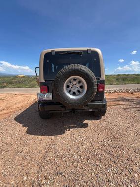 Blue 2000 Jeep Wrangler Sport