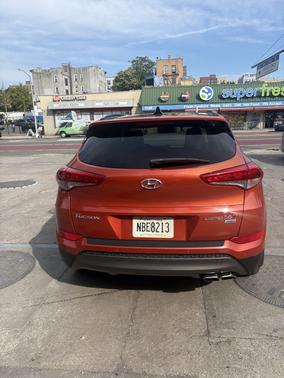 Red 2016 Hyundai TUCSON Limited