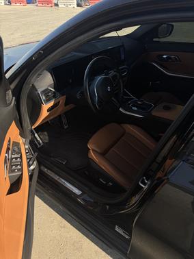 Black 2023 BMW 330 i xDrive