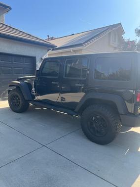 Black 2017 Jeep Wrangler Unlimited Sport