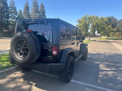 Black 2017 Jeep Wrangler Unlimited Sport