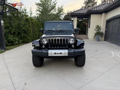 Black 2014 Jeep Wrangler Unlimited Sahara