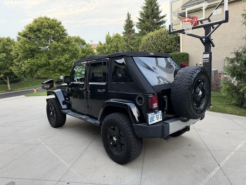 Black 2014 Jeep Wrangler Unlimited Sahara