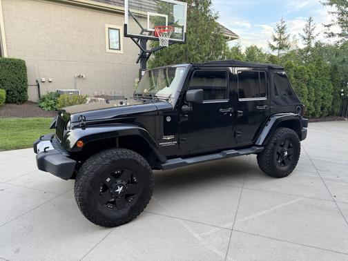Black 2014 Jeep Wrangler Unlimited Sahara