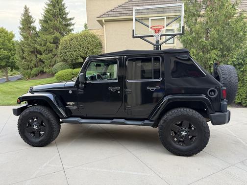 Black 2014 Jeep Wrangler Unlimited Sahara