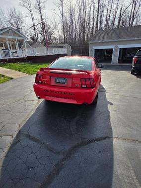 Red 2000 Ford Mustang GT
