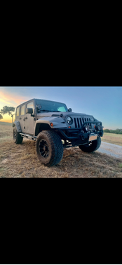 Gray 2013 Jeep Wrangler Unlimited Sport