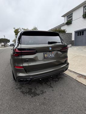 Green 2024 BMW X5 M60i