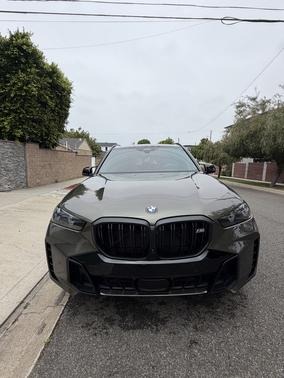 Green 2024 BMW X5 M60i