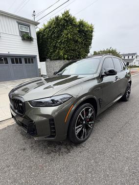 Green 2024 BMW X5 M60i