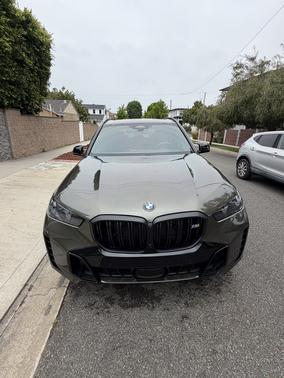 Green 2024 BMW X5 M60i
