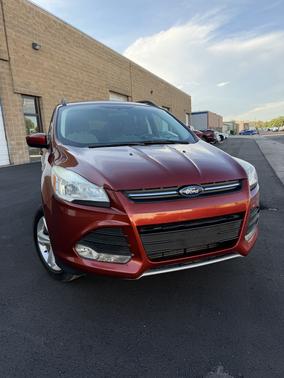 Red 2014 Ford Escape SE