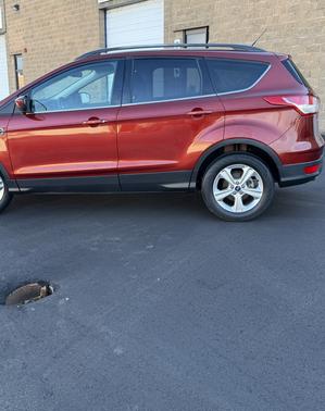 Red 2014 Ford Escape SE