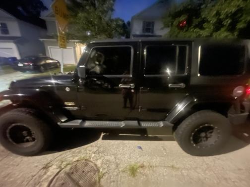 Black 2015 Jeep Wrangler Unlimited Sahara