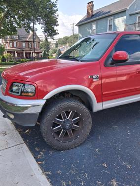 Red 2003 Ford F-150 XL