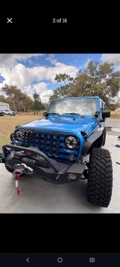 Blue 2015 Jeep Wrangler Unlimited Sport