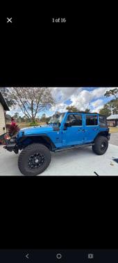 Blue 2015 Jeep Wrangler Unlimited Sport
