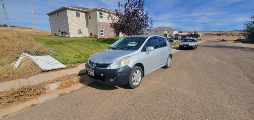 Silver 2012 Nissan Versa 1.8 SL