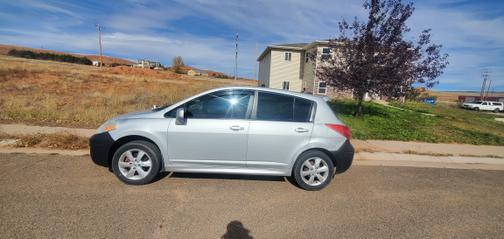 Silver 2012 Nissan Versa 1.8 SL