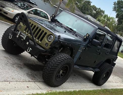 Gray 2017 Jeep Wrangler Unlimited Sport