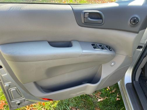 Silver 2011 Kia Sedona LX