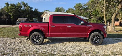 Red 2015 Ford F-150 Platinum