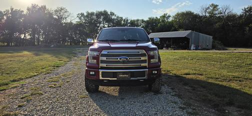 Red 2015 Ford F-150 Platinum