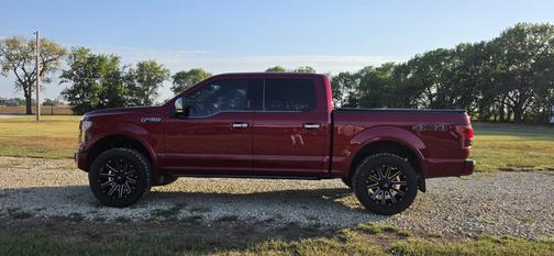 Red 2015 Ford F-150 Platinum