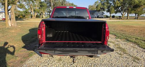 Red 2015 Ford F-150 Platinum