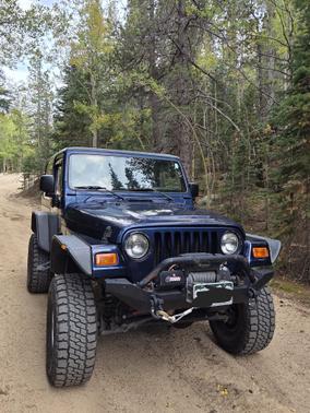Blue 2001 Jeep Wrangler Sport