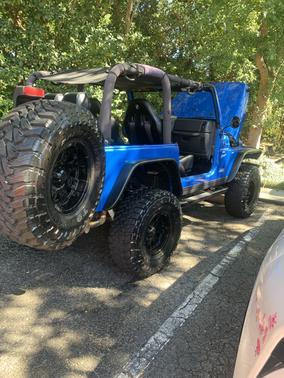 Blue 1999 Jeep Wrangler Sport