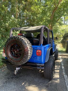 Blue 1999 Jeep Wrangler Sport