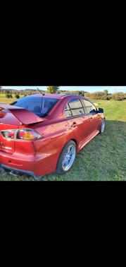 Red 2013 Mitsubishi Lancer Evolution GSR