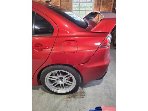 Red 2013 Mitsubishi Lancer Evolution GSR