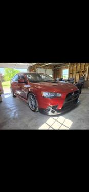 Red 2013 Mitsubishi Lancer Evolution GSR