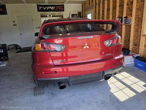 Red 2013 Mitsubishi Lancer Evolution GSR