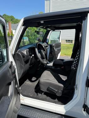 White 2015 Jeep Wrangler Unlimited Sport