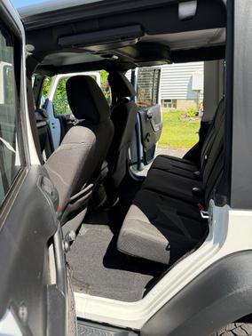 White 2015 Jeep Wrangler Unlimited Sport