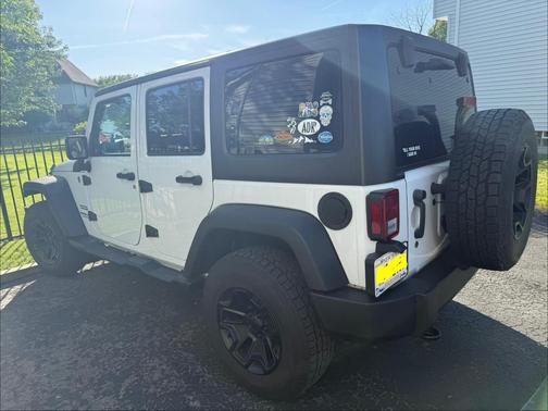 White 2015 Jeep Wrangler Unlimited Sport
