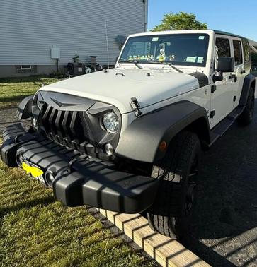 White 2015 Jeep Wrangler Unlimited Sport