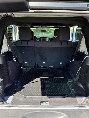 White 2015 Jeep Wrangler Unlimited Sport