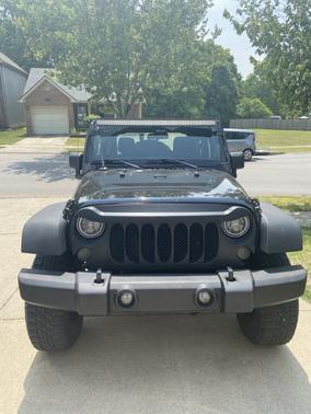 Black 2013 Jeep Wrangler Sport