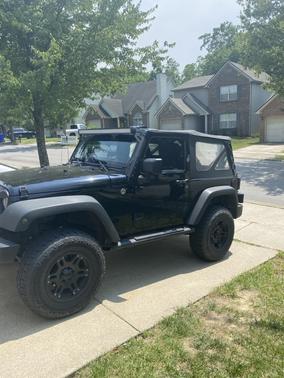 Black 2013 Jeep Wrangler Sport