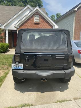 Black 2013 Jeep Wrangler Sport