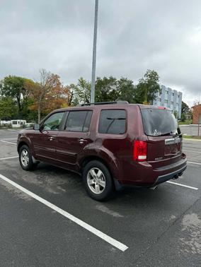 Red 2009 Honda Pilot EX