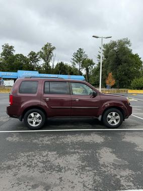 Red 2009 Honda Pilot EX