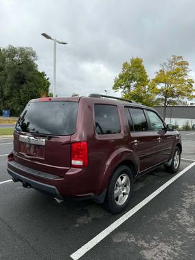 Red 2009 Honda Pilot EX