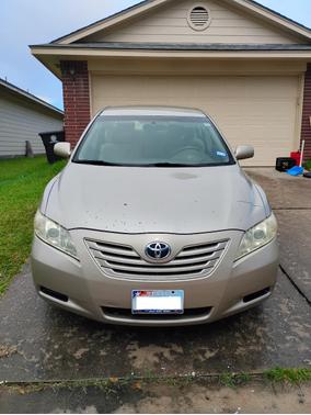 Gold 2009 Toyota Camry LE