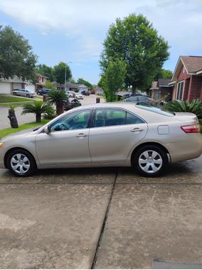 Gold 2009 Toyota Camry LE